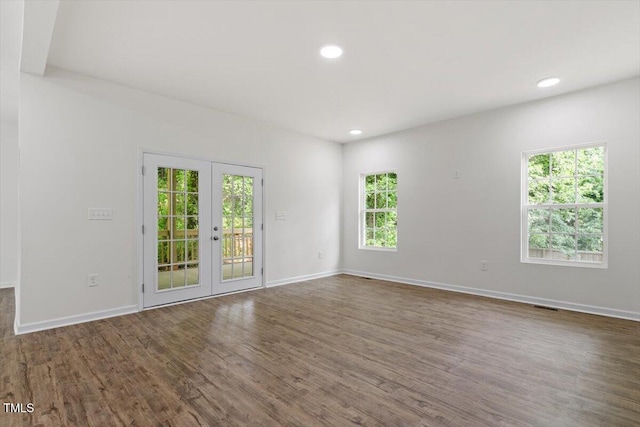 1408 S St, Durham, NC 27707 - empty room with wood finished floors, french doors, and recessed lighting