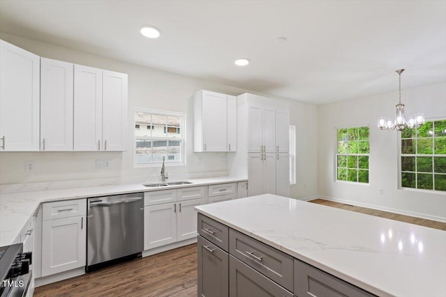 1408 S St, Durham, NC 27707 - kitchen with stainless steel dishwasher, healthy amount of natural light, dark wood finished floors, decorative light fixtures, and recessed lighting
