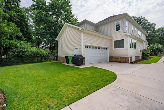 309 N Mason St, Apex, NC 27502 - view of home's exterior with concrete driveway, a garage, and brick siding