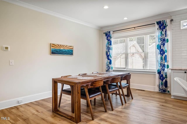 309 N Mason St, Apex, NC 27502 - dining space with ornamental molding, light wood-style flooring, and recessed lighting