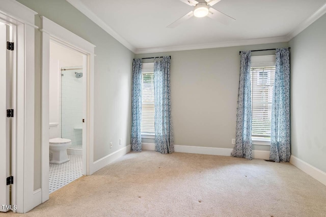 309 N Mason St, Apex, NC 27502 - spare room with ornamental molding, a ceiling fan, and carpet floors