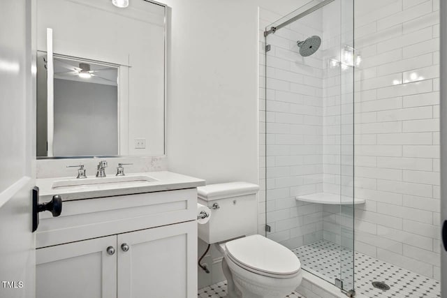 309 N Mason St, Apex, NC 27502 - full bathroom featuring a shower stall, vanity, and a ceiling fan