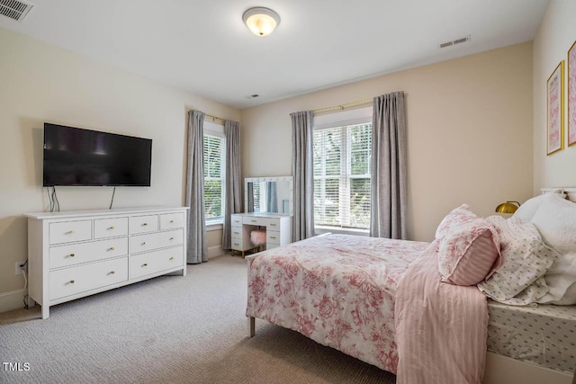 309 N Mason St, Apex, NC 27502 - bedroom with light colored carpet and baseboards