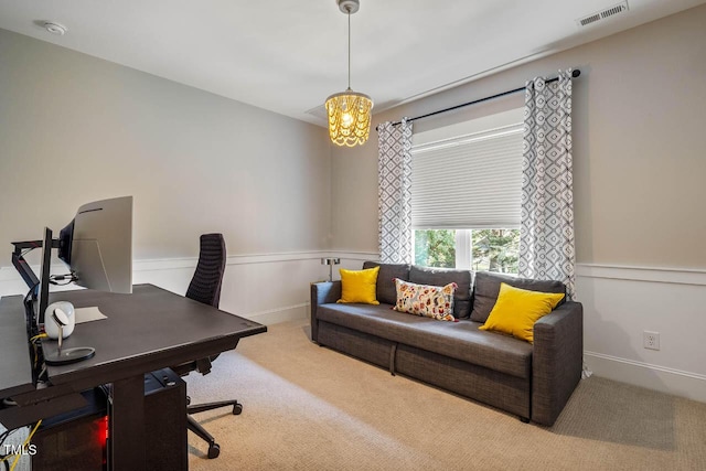 309 N Mason St, Apex, NC 27502 - carpeted home office with a chandelier and baseboards
