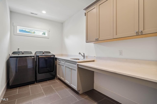 309 N Mason St, Apex, NC 27502 - laundry room featuring washer and clothes dryer, cabinet space, dark tile patterned floors, and recessed lighting