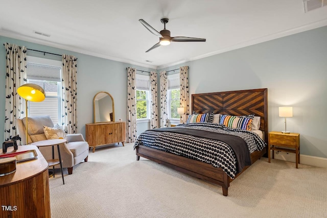 309 N Mason St, Apex, NC 27502 - bedroom with light colored carpet, ornamental molding, and ceiling fan