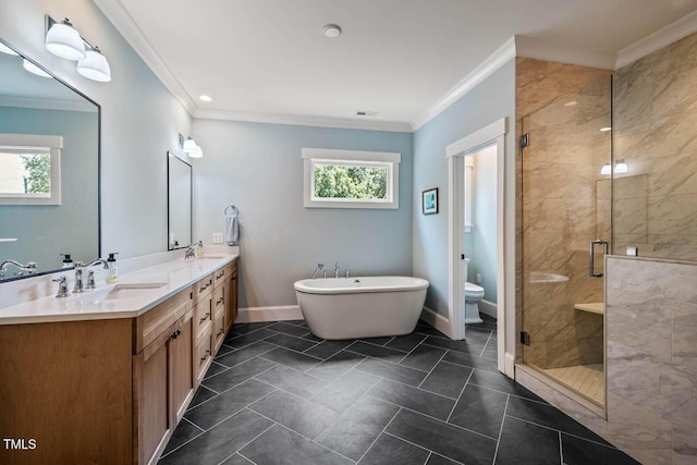 309 N Mason St, Apex, NC 27502 - bathroom featuring a shower stall, double vanity, crown molding, a soaking tub, and recessed lighting