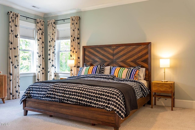 309 N Mason St, Apex, NC 27502 - carpeted bedroom with ornamental molding and baseboards