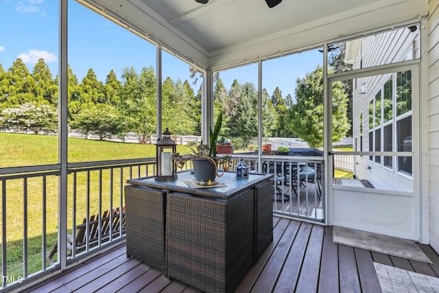90 E Calvert Ct, Clayton, NC 27527 - sunroom / solarium featuring outdoor dining space, view of wooded area, and a ceiling fan