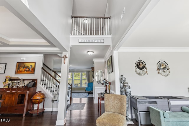 90 E Calvert Ct, Clayton, NC 27527 - entryway with crown molding, stairs, and wood finished floors