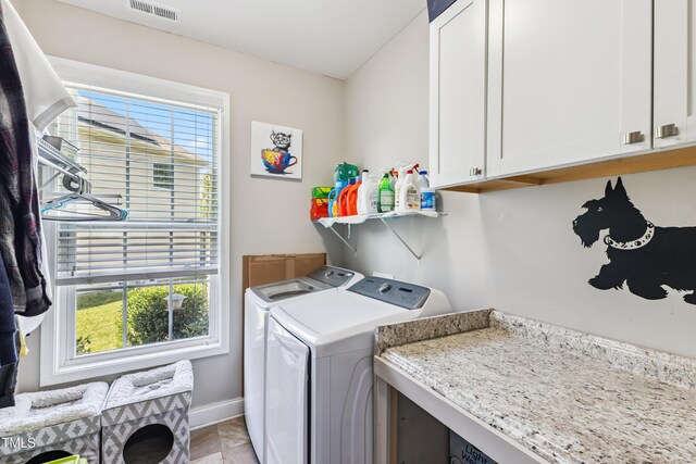 90 E Calvert Ct, Clayton, NC 27527 - laundry room featuring cabinet space and washing machine and clothes dryer