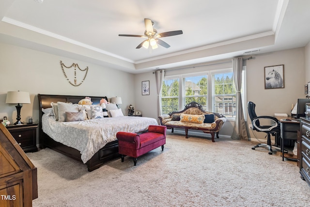 90 E Calvert Ct, Clayton, NC 27527 - bedroom with a tray ceiling, crown molding, carpet flooring, a ceiling fan, and a desk