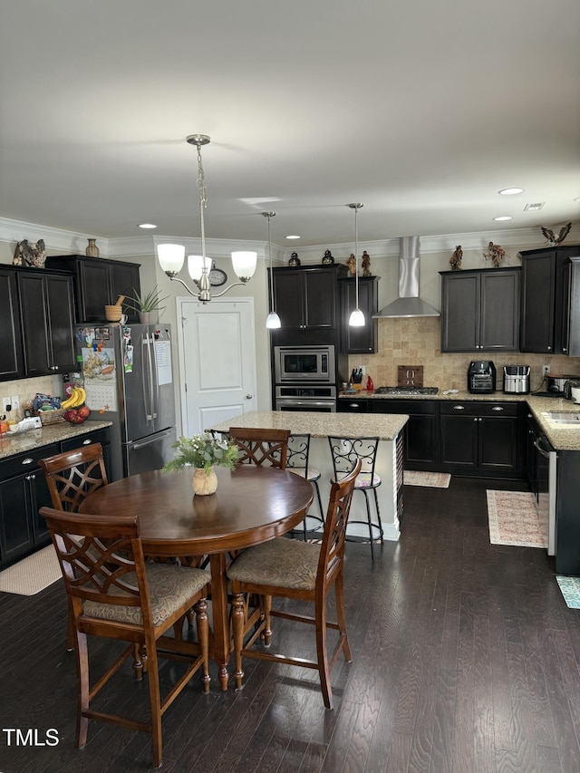 90 E Calvert Ct, Clayton, NC 27527 - dining room with dark wood-style flooring, crown molding, and a chandelier