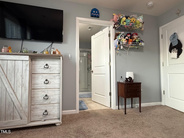 90 E Calvert Ct, Clayton, NC 27527 - carpeted bedroom with ensuite bathroom and baseboards
