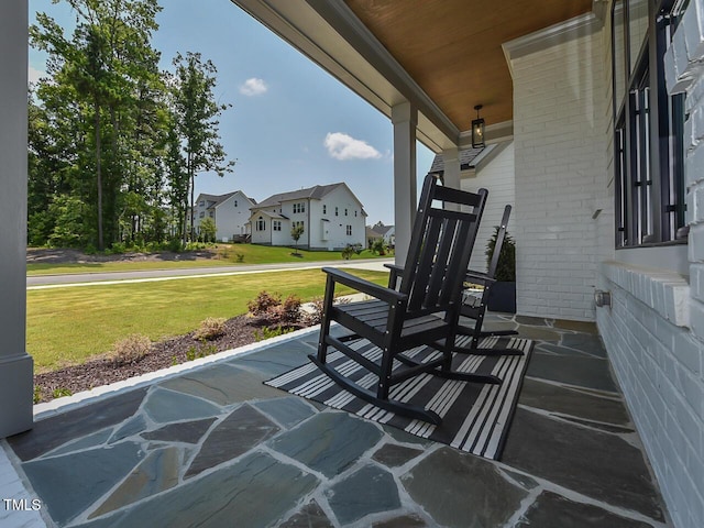 3666 Jordan Estates Way, New Hill, NC 27562 - covered porch featuring a residential view and a lawn