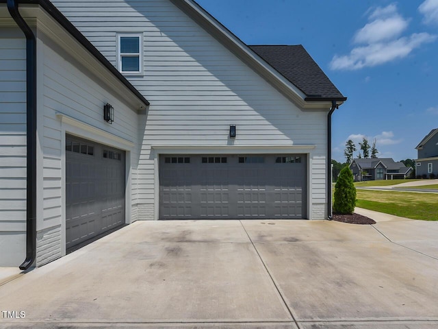 3666 Jordan Estates Way, New Hill, NC 27562 - view of property exterior featuring a garage and concrete driveway