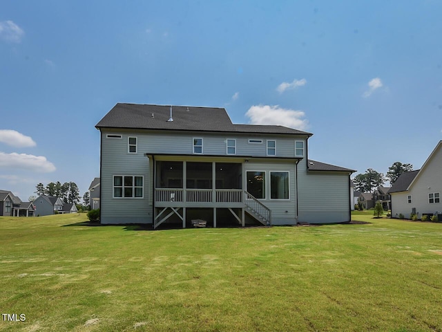 3666 Jordan Estates Way, New Hill, NC 27562 - rear view of property with a sunroom and a lawn