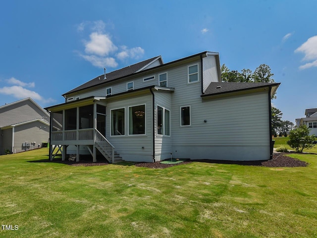 3666 Jordan Estates Way, New Hill, NC 27562 - rear view of property with a sunroom, a yard, and stairway
