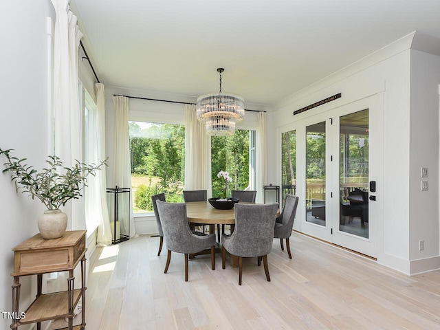 3666 Jordan Estates Way, New Hill, NC 27562 - sunroom / solarium featuring a chandelier and french doors