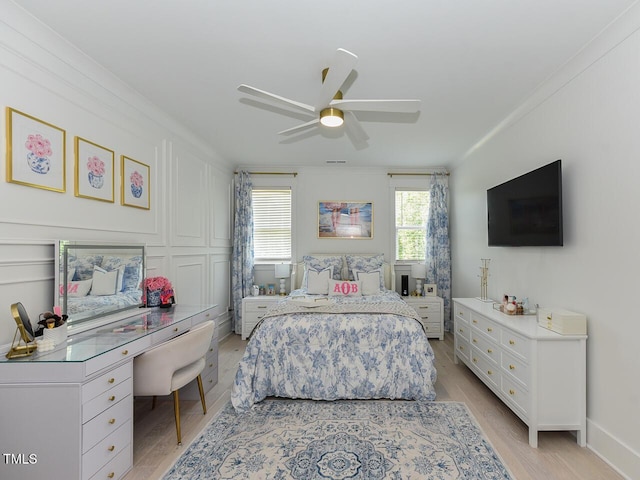3666 Jordan Estates Way, New Hill, NC 27562 - bedroom featuring light wood-style floors, an office area, a ceiling fan, and ornamental molding