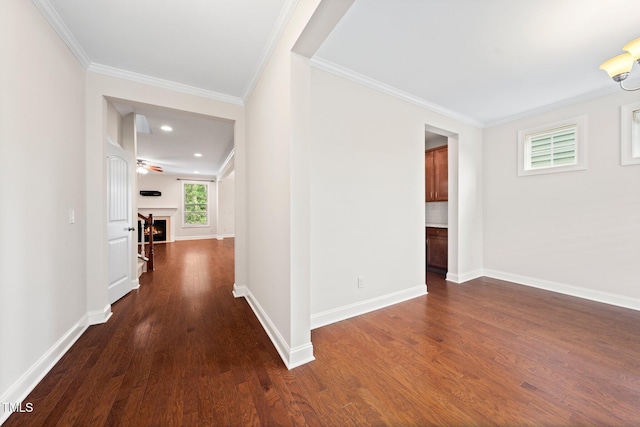 316 Rapport Dr, Cary, NC 27519 - hall with dark wood-type flooring and crown molding