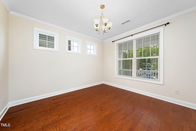 316 Rapport Dr, Cary, NC 27519 - empty room with a chandelier, ornamental molding, and dark wood-style flooring