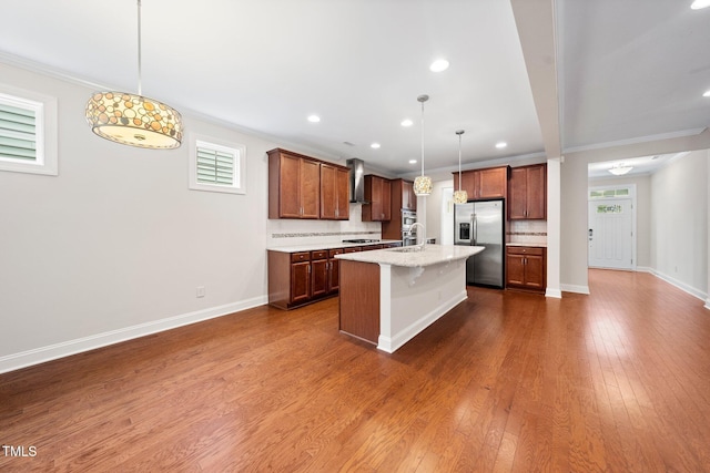 316 Rapport Dr, Cary, NC 27519 - kitchen featuring stainless steel fridge with ice dispenser, wall chimney exhaust hood, ornamental molding, backsplash, and a kitchen bar