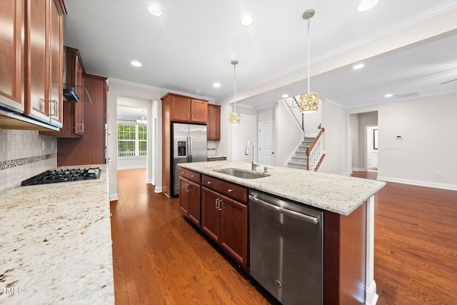 316 Rapport Dr, Cary, NC 27519 - kitchen with appliances with stainless steel finishes, decorative backsplash, crown molding, dark wood-type flooring, and recessed lighting