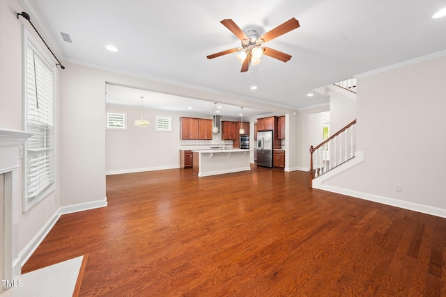 316 Rapport Dr, Cary, NC 27519 - unfurnished living room featuring dark wood-type flooring, ornamental molding, stairway, a ceiling fan, and recessed lighting