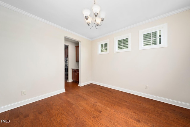 316 Rapport Dr, Cary, NC 27519 - unfurnished room featuring a chandelier, dark wood-style floors, and crown molding