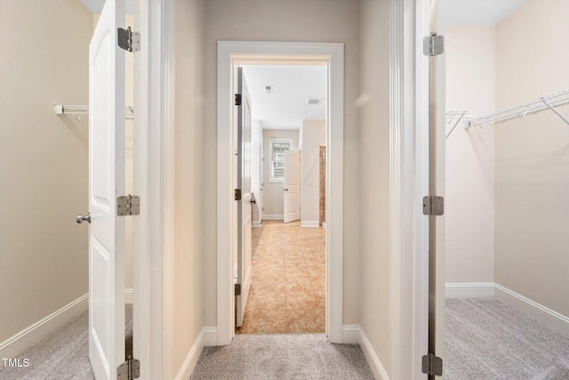 316 Rapport Dr, Cary, NC 27519 - hallway featuring light carpet and baseboards