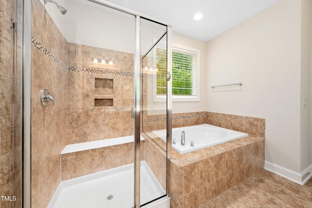 316 Rapport Dr, Cary, NC 27519 - full bathroom with a shower stall, a garden tub, and tile patterned floors