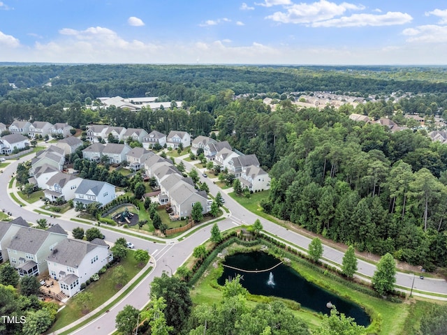 316 Rapport Dr, Cary, NC 27519 - aerial view of residential area with a large body of water and a forest
