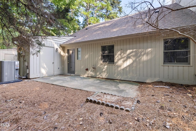 110 Mossbark Ln, Chapel Hill, NC 27514 - rear view of property with roof with shingles and a patio area