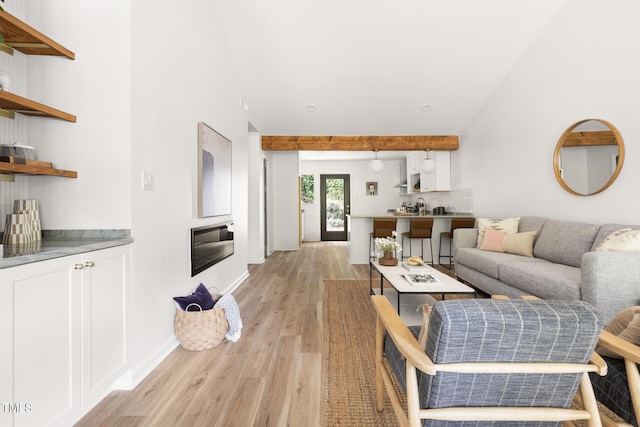 110 Mossbark Ln, Chapel Hill, NC 27514 - living area featuring light wood-style floors and beamed ceiling