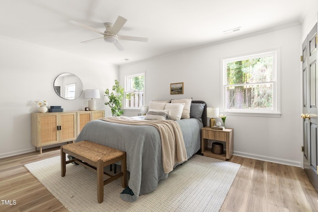 110 Mossbark Ln, Chapel Hill, NC 27514 - bedroom featuring ornamental molding, light wood-style flooring, and ceiling fan
