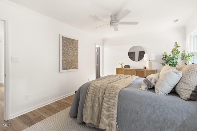110 Mossbark Ln, Chapel Hill, NC 27514 - bedroom featuring wood finished floors, ornamental molding, and a ceiling fan