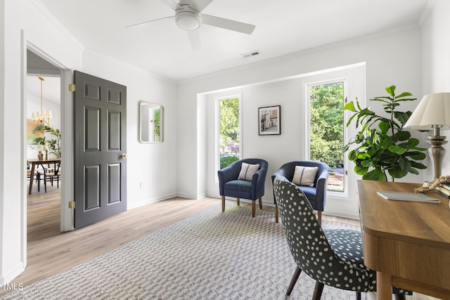 110 Mossbark Ln, Chapel Hill, NC 27514 - office featuring ornamental molding, light wood finished floors, a ceiling fan, and a chandelier