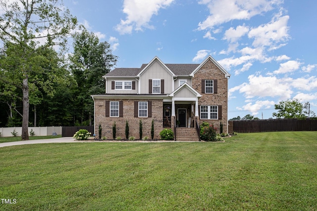 3082 Cascade Dr, Burlington, NC 27217 - view of front of home featuring brick siding and board and batten siding