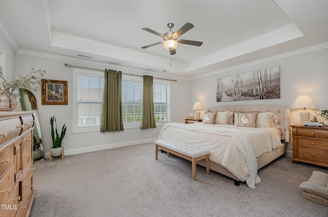 3082 Cascade Dr, Burlington, NC 27217 - carpeted bedroom featuring a raised ceiling, crown molding, and ceiling fan