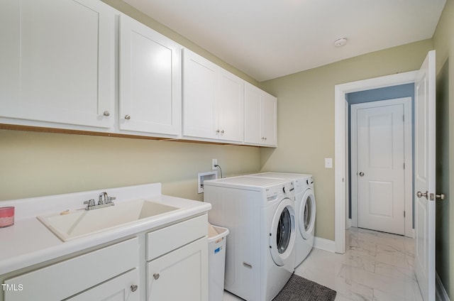 3082 Cascade Dr, Burlington, NC 27217 - washroom featuring cabinet space, light marble finish floors, and washer and dryer