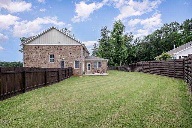 3082 Cascade Dr, Burlington, NC 27217 - fenced backyard featuring a patio area