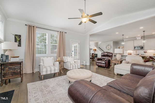 3082 Cascade Dr, Burlington, NC 27217 - living room featuring ceiling fan, dark wood-style floors, ornamental molding, lofted ceiling, and stairs