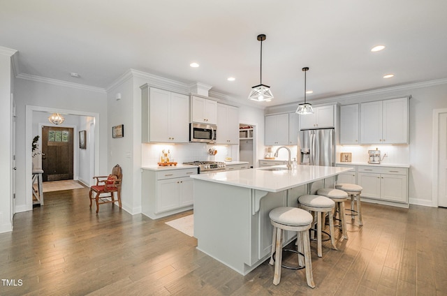3082 Cascade Dr, Burlington, NC 27217 - kitchen with appliances with stainless steel finishes, backsplash, light countertops, recessed lighting, and wood-type flooring
