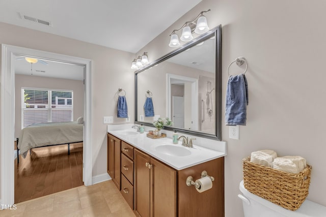 936 Blue Bird Ln, Wake Forest, NC 27587 - ensuite bathroom with double vanity and a ceiling fan