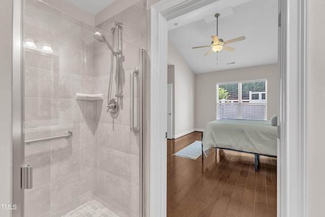 936 Blue Bird Ln, Wake Forest, NC 27587 - bathroom featuring lofted ceiling, a stall shower, a ceiling fan, wood finished floors, and ensuite bathroom