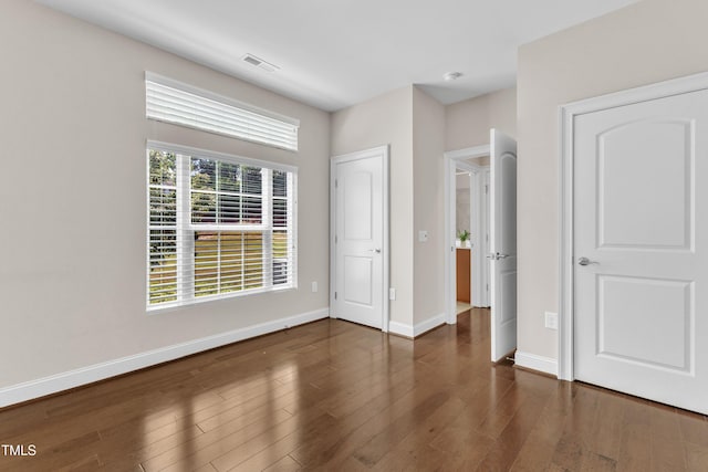 936 Blue Bird Ln, Wake Forest, NC 27587 - unfurnished bedroom with wood finished floors