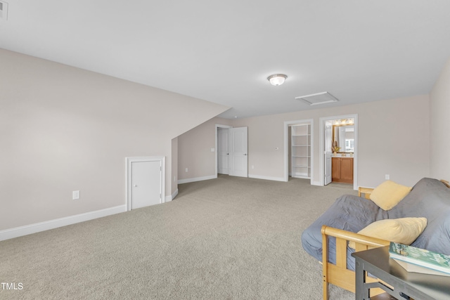 936 Blue Bird Ln, Wake Forest, NC 27587 - sitting room with light colored carpet and attic access