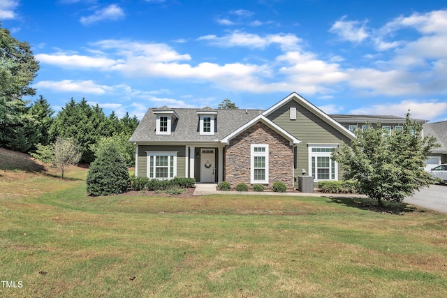936 Blue Bird Ln, Wake Forest, NC 27587 - view of front of property with stone siding, a front yard, and a shingled roof