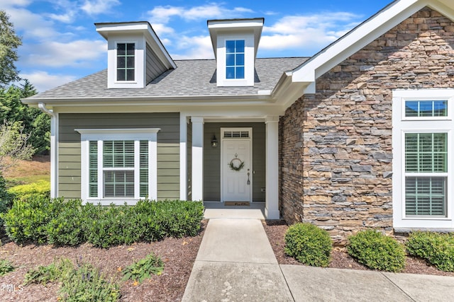 936 Blue Bird Ln, Wake Forest, NC 27587 - entrance to property featuring stone siding and roof with shingles